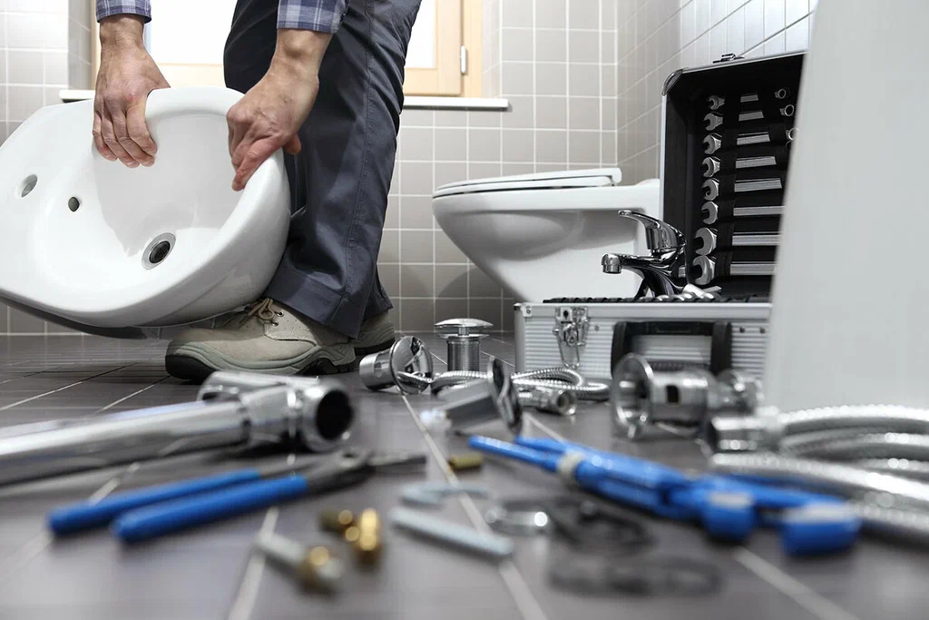 Plumbing tools prepared for a bathroom repair in Commerce City
